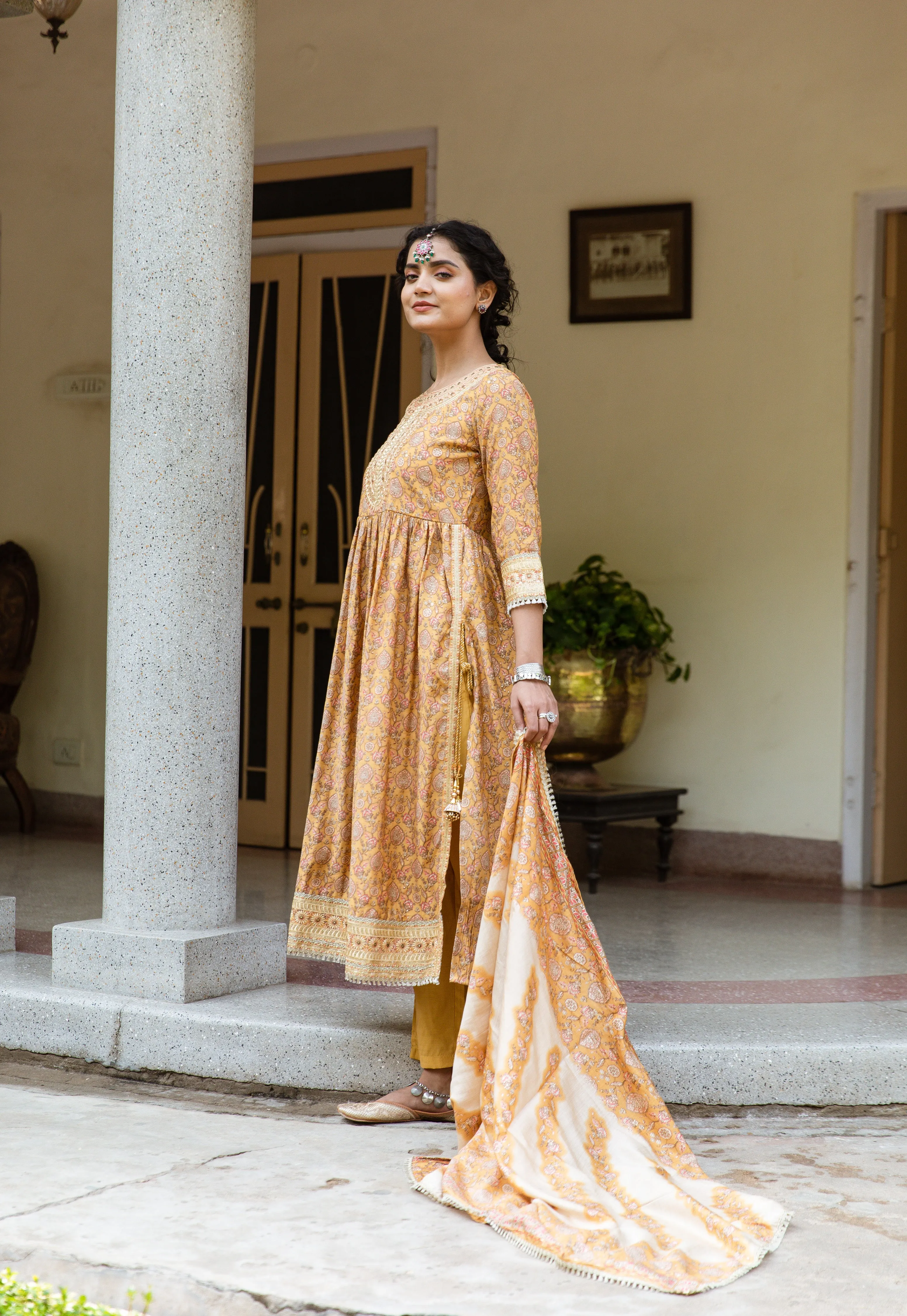 Women Mustard Chanderi Nyara Cut A-Line Kurta Trouser Dupatta & Fancy Potli Set